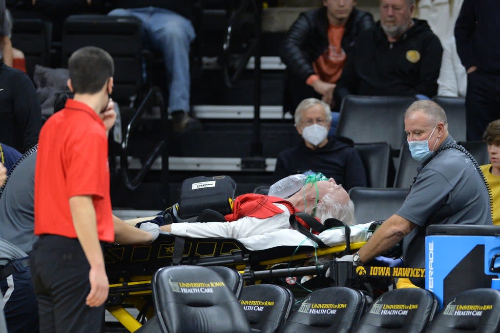 A fan given CPR  during a basketball match in Iowa City on 3 January 2022 (Jeffrey Becker/USA TODAY Sports)
