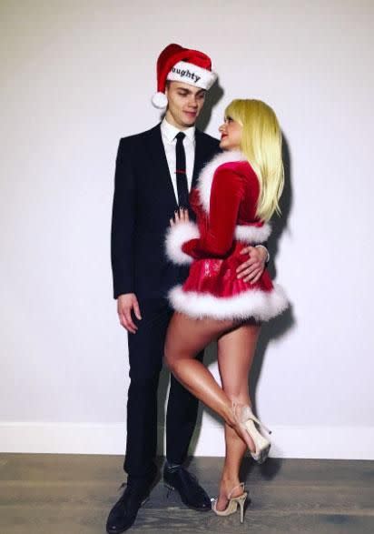 Ariel Winter and boyfriend Levi Meaden pose for a racy Christmas snap. Source: Instagram