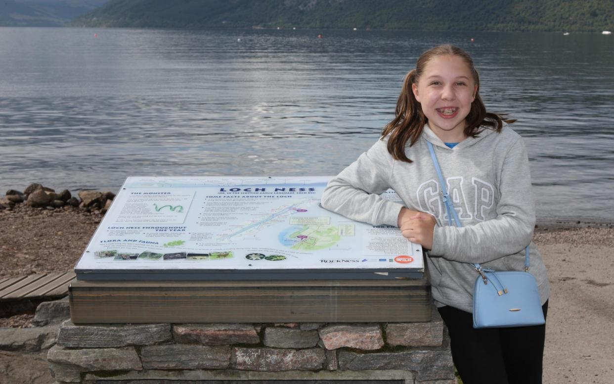 Charlotte Robinson on the shores of Loch Ness where she believes she took a photograph of the creature in 2018