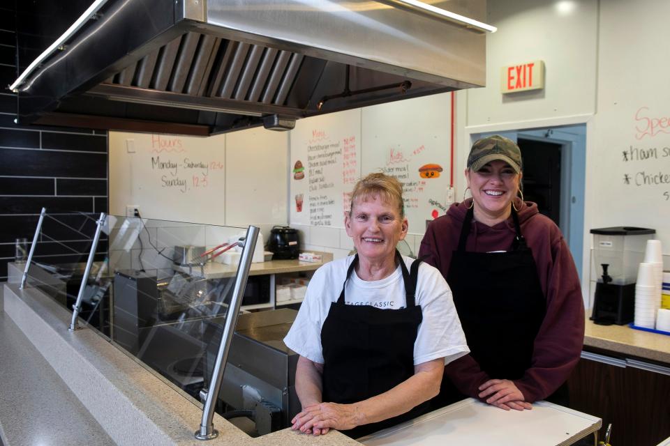 Kathy Cline (left) and manager Alexa Lewis stand inside of Krazy Foods restaurant inside of the River Valley Mall on January 17, 2024, in Lancaster, Ohio.