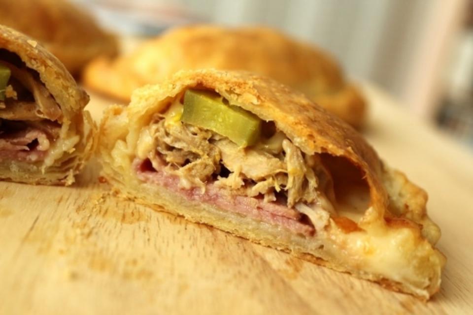 <p>Mission Food Adventure</p><p> A creative twist on empanadas filled with the flavors of a classic Cuban sandwich.</p><p><strong>Get the recipe: </strong><a href="https://mission-food.com/stuffed-cuban-sandwich-empanadas-and/" rel="nofollow noopener" target="_blank" data-ylk="slk:Cuban Sandwich Empanadas;elm:context_link;itc:0;sec:content-canvas" class="link ">Cuban Sandwich Empanadas</a></p>