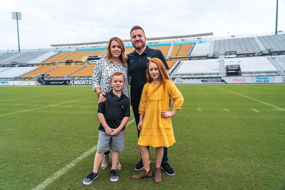 Alex Golesh with his wife, Alexis, and their son, Barrett, and daughter, Corbin