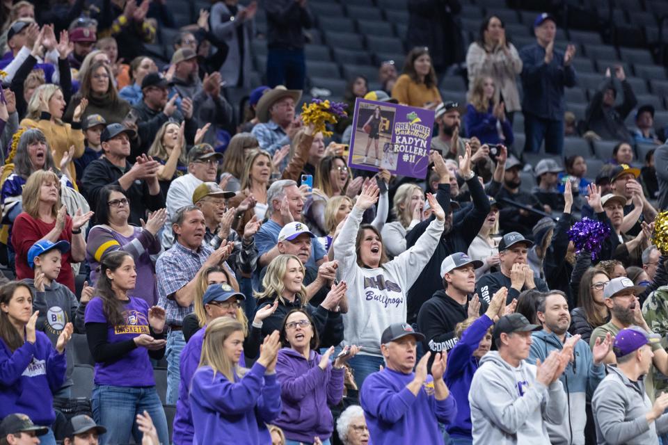 Bret Harte Bullfrogs fans cheer for the team during the fourth quarter in the CIF Division V girls basketball State Championship on Saturday, March 11, 2023, at Golden 1 Center in Sacramento. The Bullfrogs defeated the Vikings 62-39. (SARA NEVIS/FOR THE RECORD)