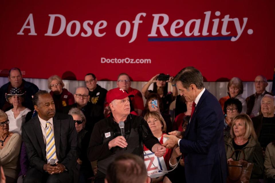 <div class="inline-image__caption"><p>Ben Carson looks on as Dr. Oz checks the blood pressure of an attendee during a campaign event for in Bristol, Pennsylvania, on April 21, 2022. </p></div> <div class="inline-image__credit">Hannah Beier/Reuters</div>
