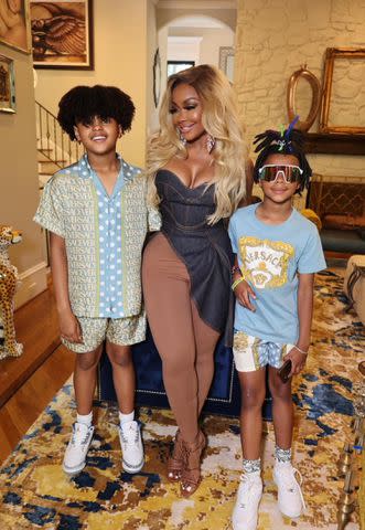 <p>Freddy O</p> Phaedra Parks with her sons Ayden and Dylan at Ayden's 13th birthday on May 26, 2023. Photo by Freddy O.