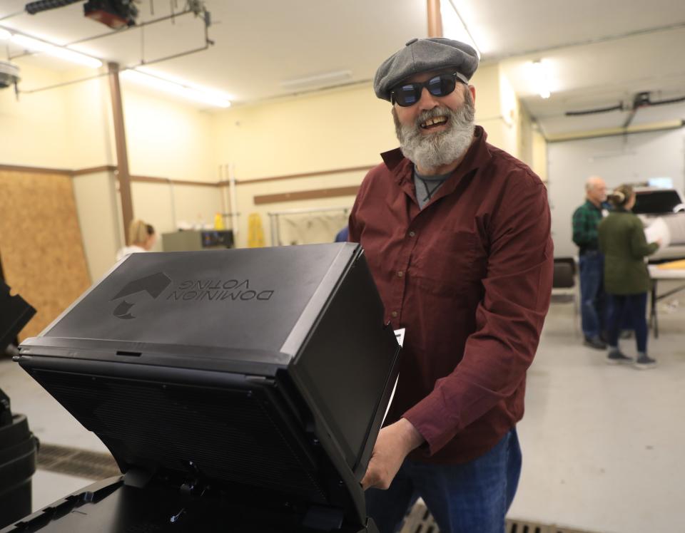 Terrence Mills casts his ballot at the New Hamburg Fire District in the Town of Poughkeepsie on November 7, 2023.