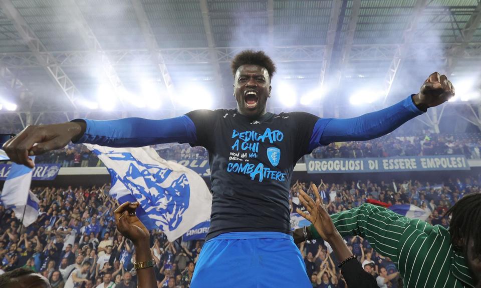 <span>M'Baye Niang, scorer of Empoli’s winning goal against Roma, celebrates after the final whistle. </span><span>Photograph: Gabriele Maltinti/Getty Images</span>