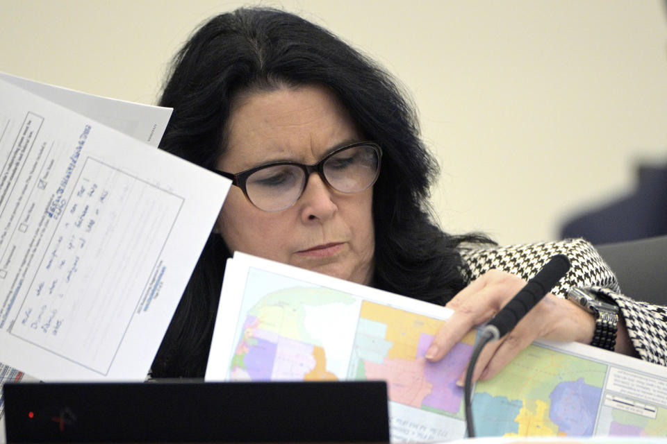 FILE - State Sen. Kelli Stargel looks through redistricting maps during a Senate Committee on Reapportionment hearingon, Jan. 13, 2022, in Tallahassee, Fla. A congressional map approved by Florida Republican Gov. Ron DeSantis and drawn by his staff is unconstitutional because it breaks up a district where Black voters can choose their representatives, a state judge said Wednesday, May 11, 2022. (AP Photo/Phelan M. Ebenhack, File)