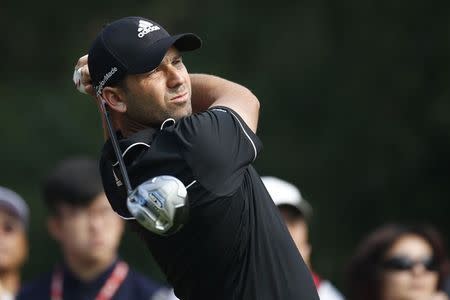 Sergio Garcia of Spain tees off on the 14th hole during the first round of the WGC-HSBC Champions golf tournament in Shanghai November 6, 2014. REUTERS/Aly Song
