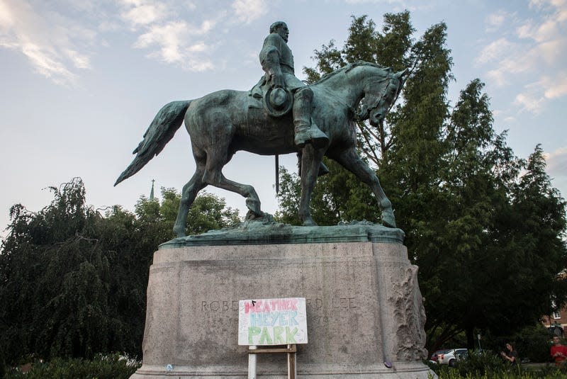 CHARLOTTESVILLE, VA - August 18, 2017: MANDATORY CREDIT Bill Tompkins/Getty Images Sign underneath staue of Conferderate General Robert E. Lee that reads ‘HEATHER HEYER PARK’ on August 18, 2017 in Charlottesville. On August 12, 2017, a car was deliberately driven into a crowd of people who had been peacefully protesting the Unite the Right rally in Charlottesville, Virginia, killing one and injuring 28. T - Photo: Bill Tompkins (Getty Images)