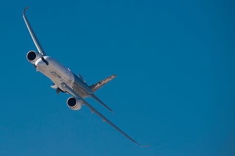 An Airbus A350 being put through its paces during a presentation flight - Credit: Getty