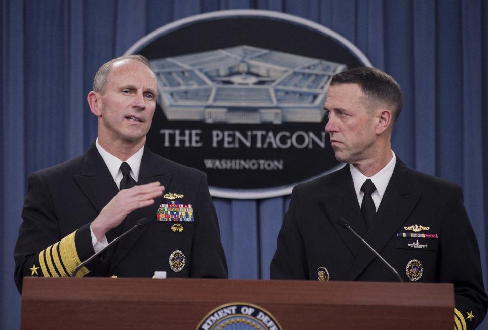 Chief of Naval Operations Adm. Jonathan W. Greenert, left, accompanied by Adm. John M. Richardson, director of the Naval Nuclear Propulsion Program, speaks during a news conference at the Pentagon, Tuesday, Feb. 4, 2014. The Navy is investigating alleged cheating on tests by senior enlisted sailors training on naval nuclear reactors at Charleston, S.C., officials said Tuesday (AP Photo/Manuel Balce Ceneta)