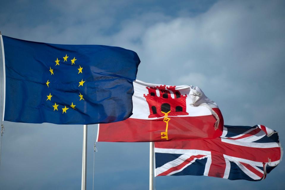 British and EU flags fly next to Gibraltar’s flag (AFP/Getty)