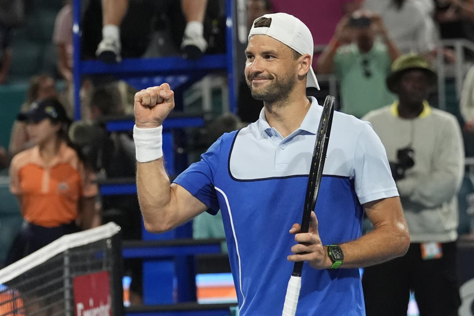 Grigor Dimitrov, of Bulgaria, celebrates after defeating Alexander Zverev, of Germany, in the semifinals of the Miami Open tennis tournament, Friday, March 29, 2024, in Miami Gardens, Fla. (AP Photo/Marta Lavandier)