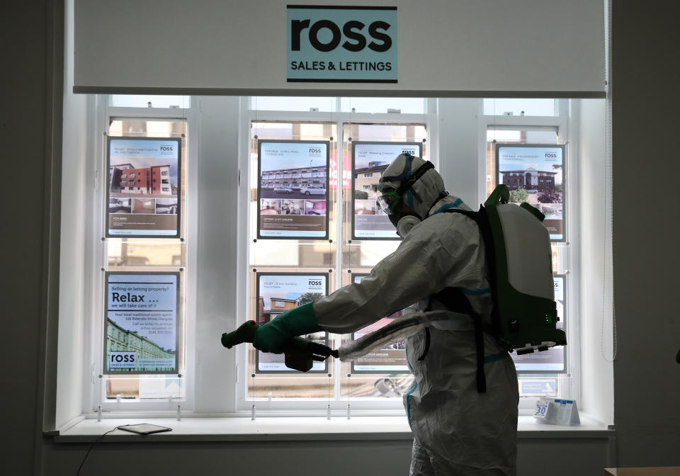 Steven Butterly from Azurablu Scotland Ltd during an electrostatic disinfection clean which follows a deep clean at Ross Sales and Lettings in Glasgow. (Photo by Andrew Milligan/PA Images via Getty Images)