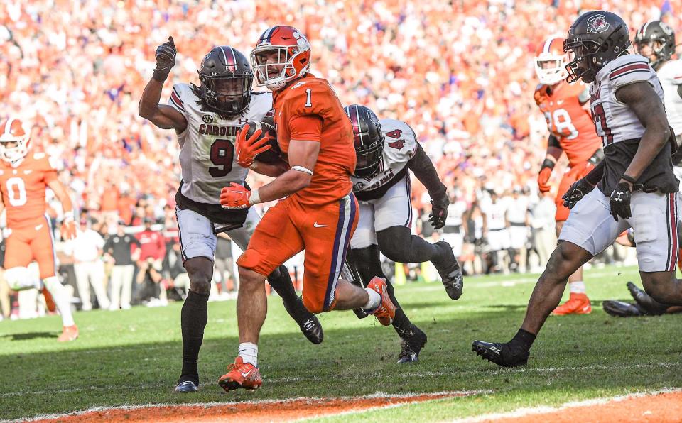 Clemson running back Will Shipley (1) runs near South Carolina corner back Cam Smith (9)  for a touchdown during the third quarter at Memorial Stadium in Clemson, South Carolina Saturday, Nov. 26, 2022.   