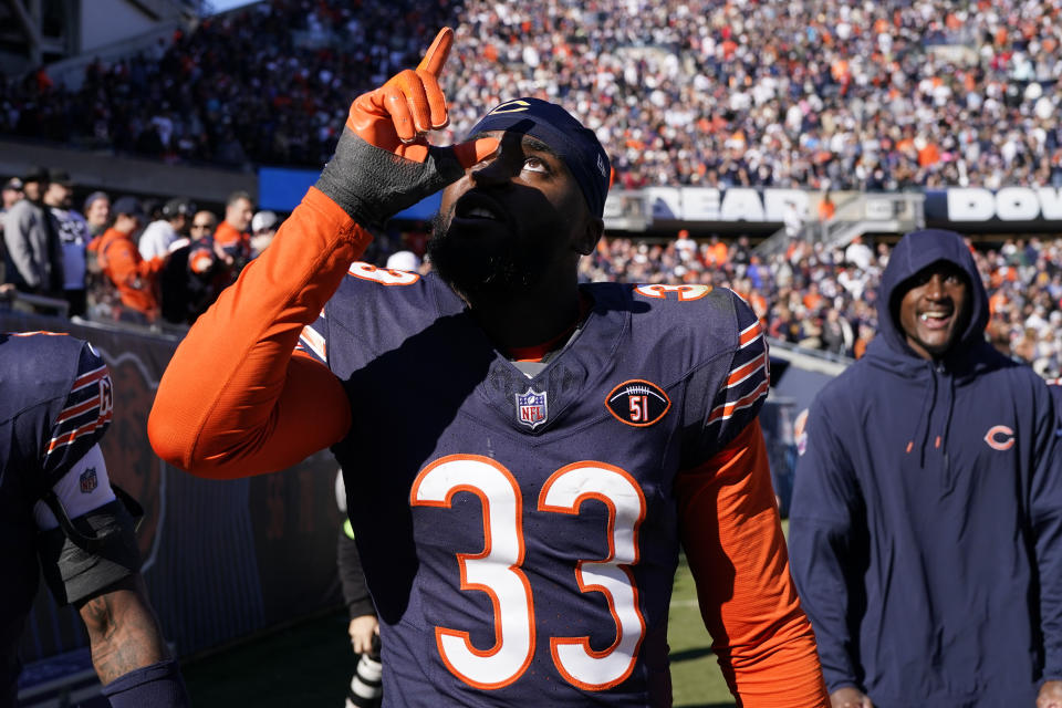 Chicago Bears cornerback Jaylon Johnson (33) celebrates after intercepting a pass and returning it 39 yards for a touchdown against the Las Vegas Raiders in the second half of an NFL football game Sunday, Oct. 22, 2023, in Chicago. (AP Photo/Nam Y. Huh)