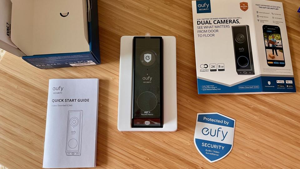 An unboxing photo of the Eufy Video Doorbell E340.