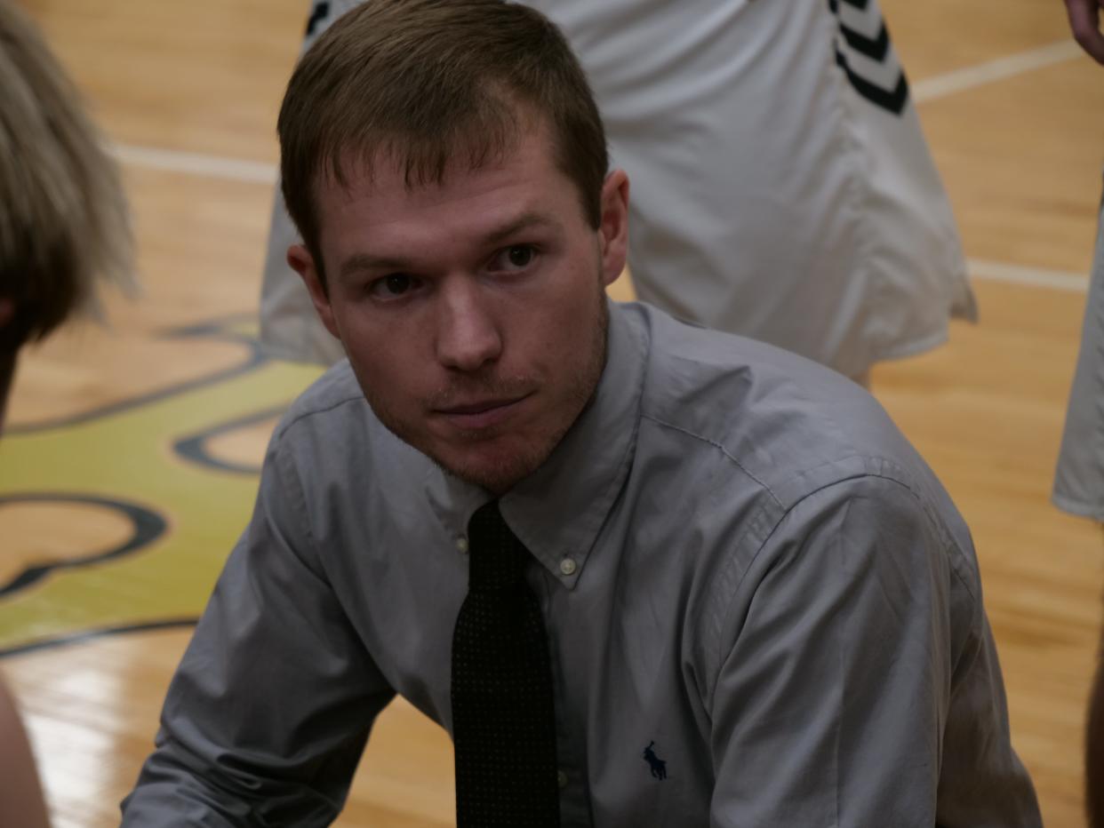 Bushland head coach Connor Copley speaks to his team during a timeout against Canadian on Tuesday, February 7, 2023 at Bushland High School.