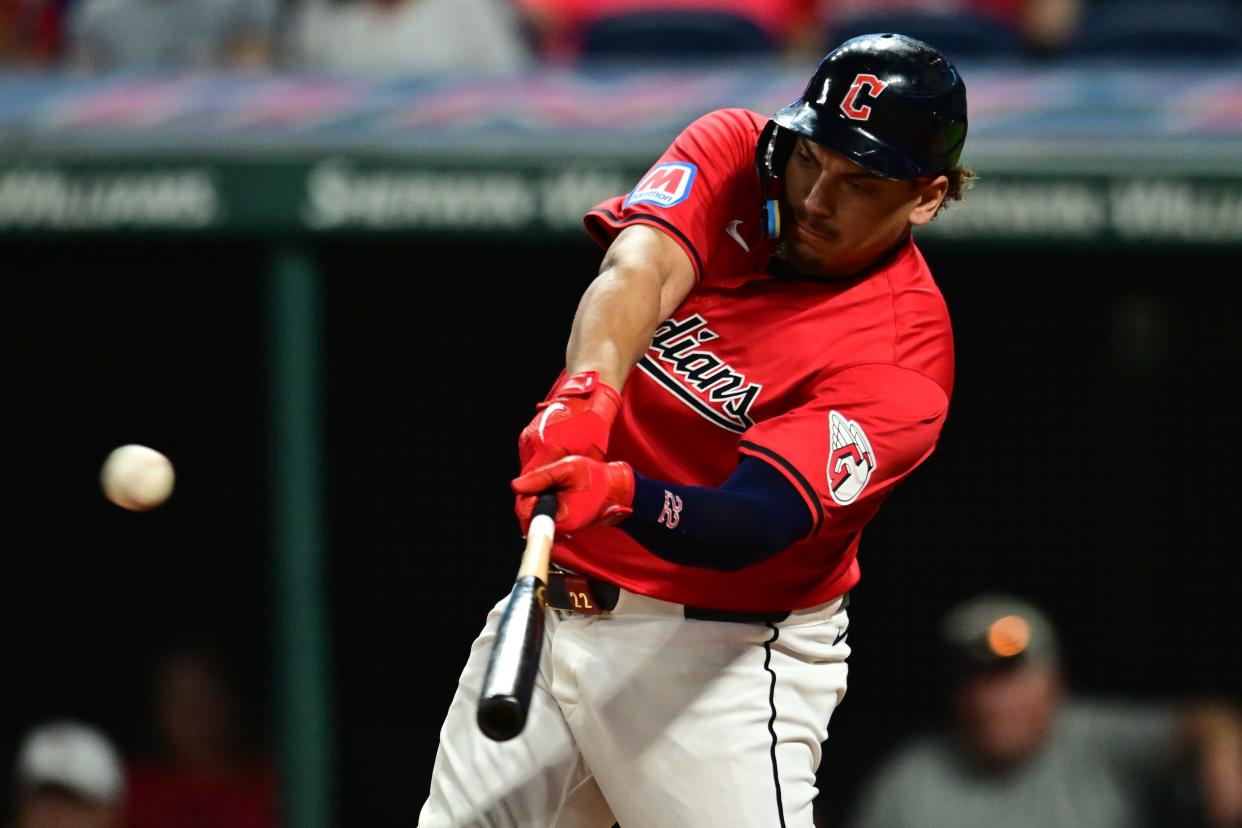 Sep 16, 2024; Cleveland, Ohio, USA; Cleveland Guardians first baseman Josh Naylor (22) hits a double during the eighth inning against the Minnesota Twins at Progressive Field. Mandatory Credit: Ken Blaze-Imagn Images