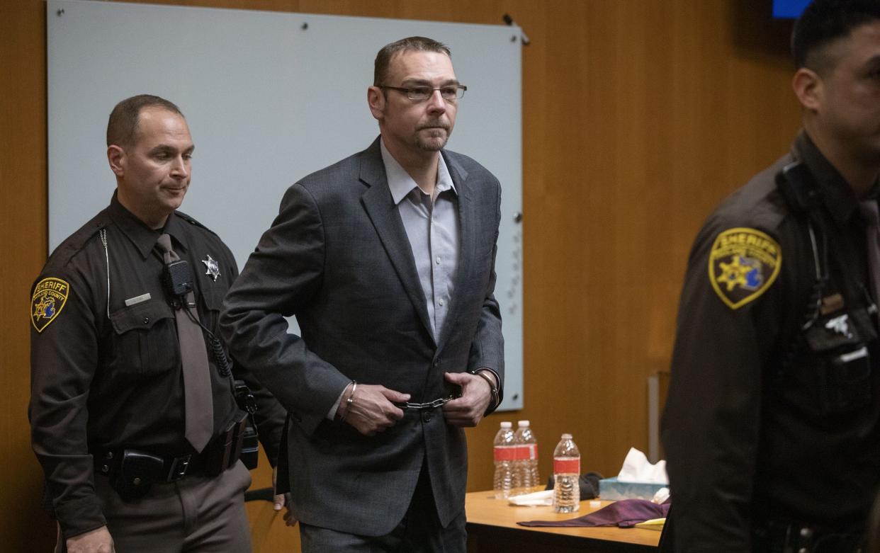 James Crumbley, father of Oxford High School school shooter Ethan Crumbley, exits the courtroom