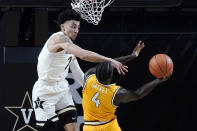 Valparaiso guard Daniel Sackey (4) drives against Vanderbilt guard Scotty Pippen Jr. (2) in the first half of an NCAA college basketball game Friday, Nov. 27, 2020, in Nashville, Tenn. (AP Photo/Mark Humphrey)