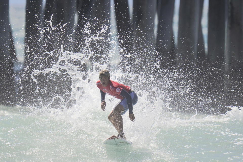 FILE - Kanoa Igarashi, of Japan, competes in the ISA World Surfing Games in Huntington Beach, Calif., Tuesday, Sept. 20, 2022. (AP Photo/Jae C. Hong, File)