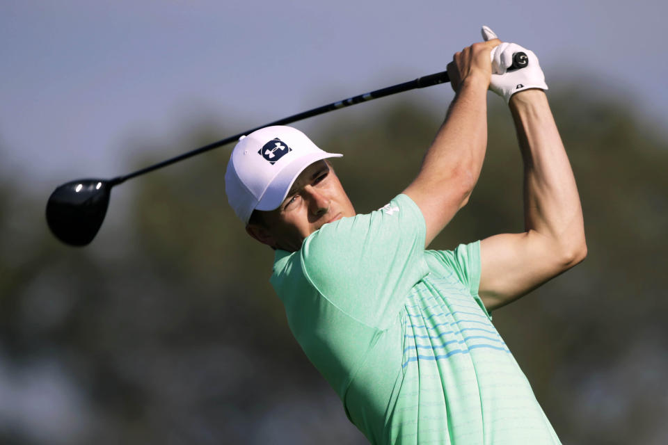 Jordan Spieth chips up to the second green on the Torrey Pines South Course during the first round The Farmers Insurance golf tournament in San Diego, Thursday, Jan. 23, 2020. (AP Photo/Alex Gallardo)