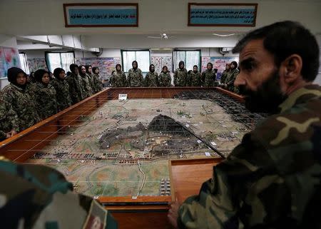Afghan National Army (ANA) soldiers attend a lesson in a classroom at the Kabul Military Training Centre (KMTC) in Kabul, Afghanistan October 23, 2016. REUTERS/Mohammad Ismail
