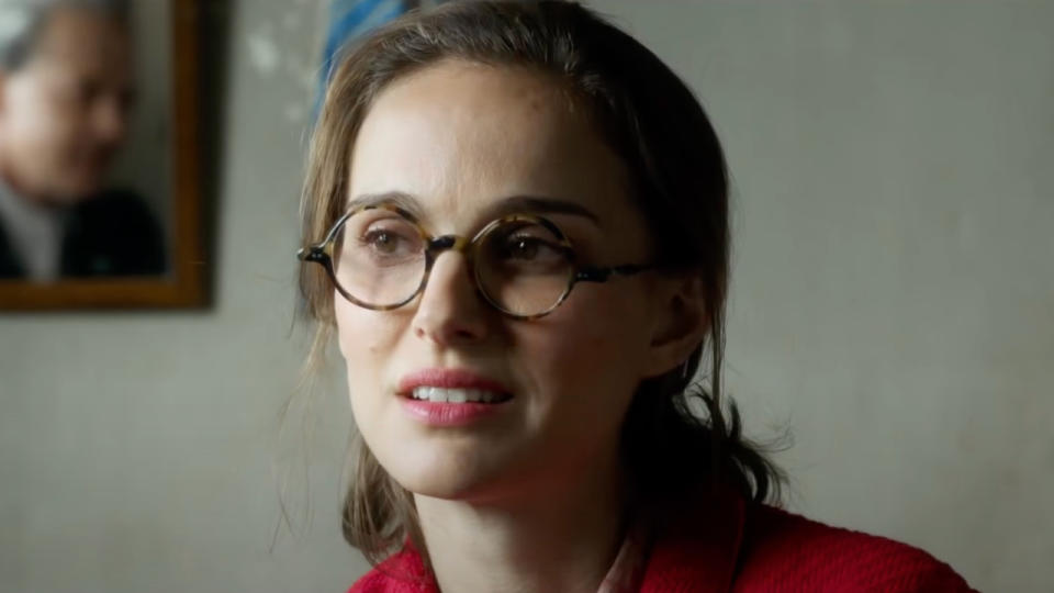 Natalie Portman sits looking concerned in Planetarium.