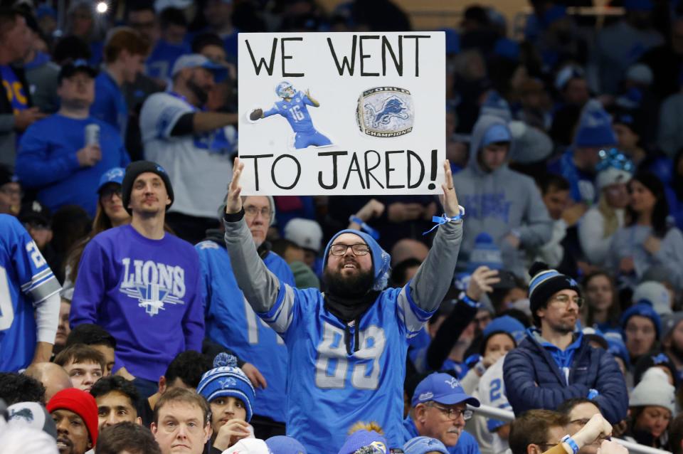 A Detroit Lions holds up a sign in the stands during the first half the wild-card round of the NFC playoffs against the L.A. Rams at Ford Field in Detroit on Sunday, Jan. 14, 2023.