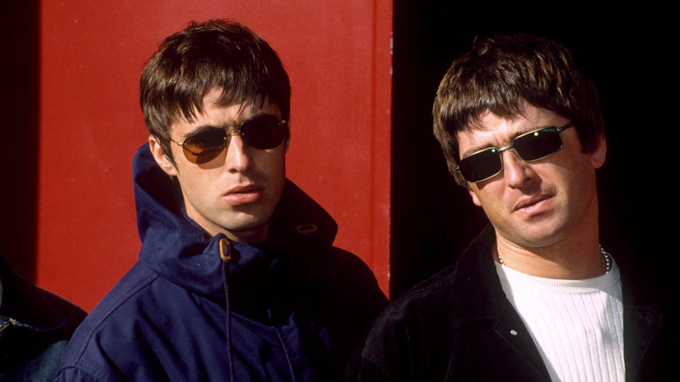 Noel Gallagher and his brother Liam during their Oasis days. (Getty)