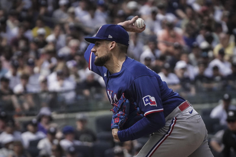 Texas Rangers pitcher Nathan Eovaldi delivers the ball during the sixth inning of a baseball game against the New York Yankees, Sunday, June 25, 2023, in New York. (AP Photo/Bebeto Matthews)