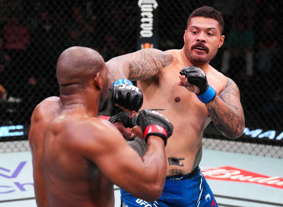 LAS VEGAS, NEVADA – MARCH 23: (R-L) Justin Tafa of New Zealand punches Karl Williams of the U.S. Virgin Islands in a heavyweight fight during the UFC Fight Night event at UFC APEX on March 23, 2024 in Las Vegas, Nevada. (Photo by Chris Unger/Zuffa LLC via Getty Images)