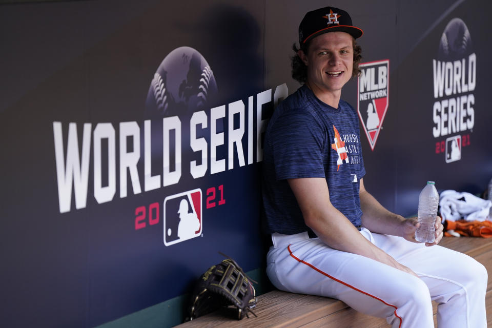 Houston Astros center fielder Jake Meyers sits in the dugout during batting practice Monday, Oct. 25, 2021, in Houston, in preparation for Game 1 of baseball's World Series tomorrow between the Houston Astros and the Atlanta Braves. (AP Photo/David J. Phillip)