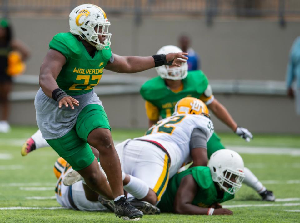 Carver’s James Smith plays running lanes during a spring game between Carver and Jeff Davis at Cramton Bowl in Montgomery, Ala., on Saturday, May 21, 2022.