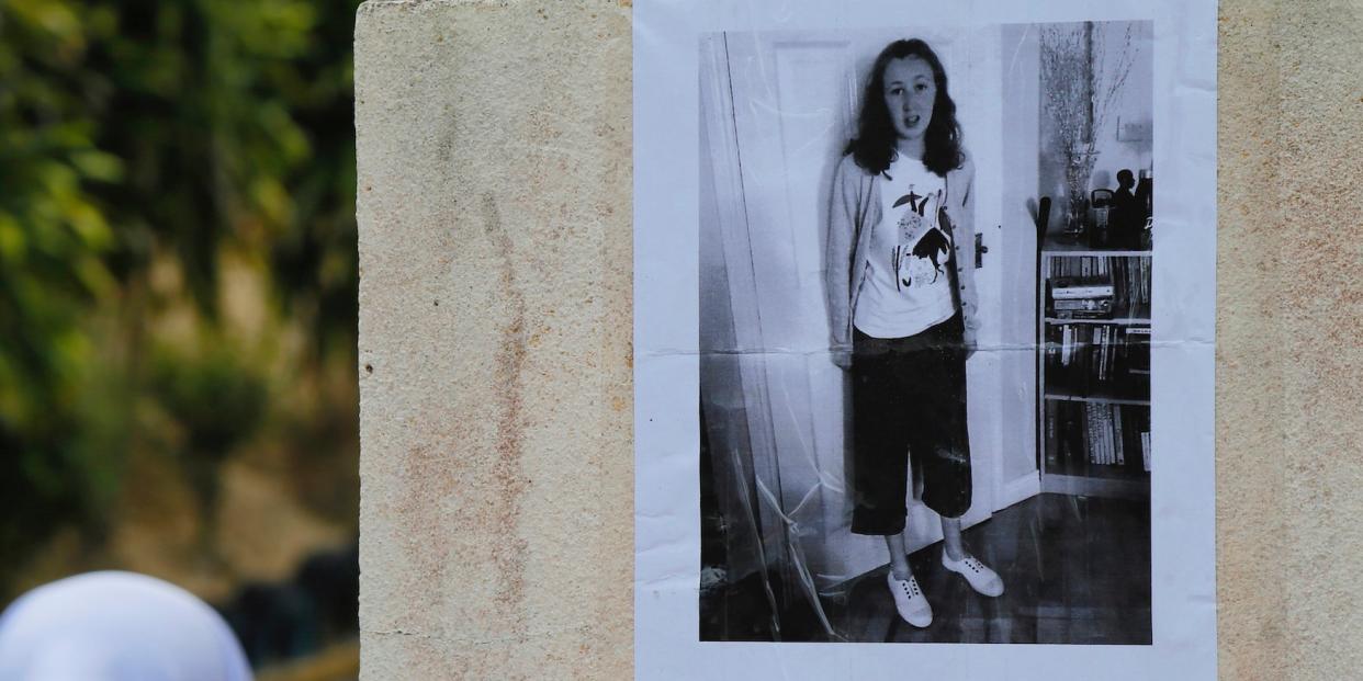 A photo of 15-year-old London girl Nora Quoirin, who went missing from The Dusun resort, is pasted on a wall at a school in Seremban, Negeri Sembilan, Malaysia, Tuesday, Aug. 6, 2019.