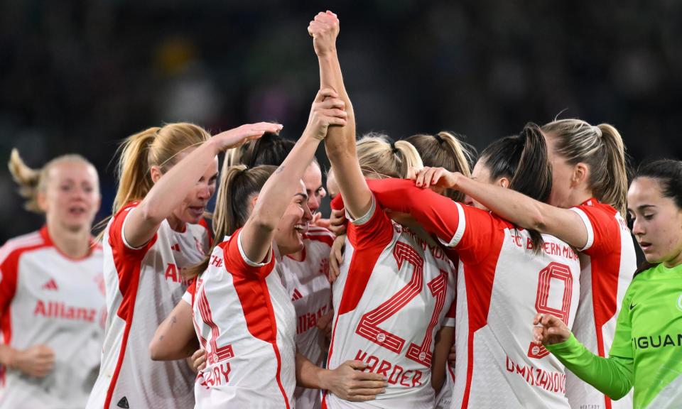 <span>Pernille Harder (21) celebrates with teammates after scoring against Wolfsburg on 23 March.</span><span>Photograph: Oliver Hardt/Getty Images for DFB</span>