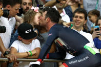 <p>Mark Cavendish of Great Britain celebrates with his daughter after the Cycling Track Men’s Omnium Points Race 66 on Day 10 of the Rio 2016 Olympic Games at the Rio Olympic Velodrome on August 15, 2016 in Rio de Janeiro, Brazil. (Photo by Bryn Lennon/Getty Images) </p>