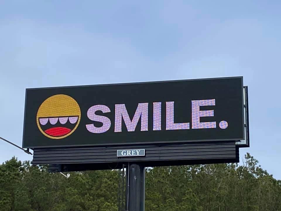 A billboard featuring the work of Wilmington artist HP Fangs, aka Haji P, aka Greyson Davis.