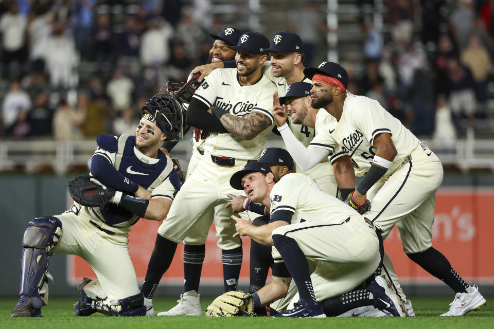 Members of the Minnesota Twins celebrate after their win over the Boston Red Sox in a baseball game, Friday, May 3, 2024, in Minneapolis. (AP Photo/Matt Krohn)
