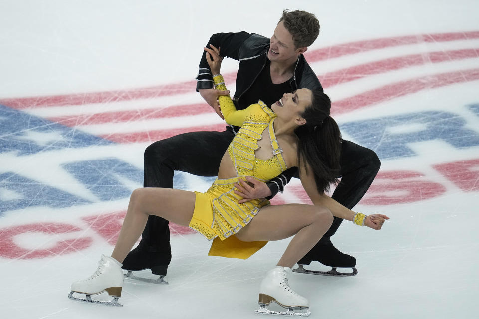 Madison Chock, front, and Evan Bates compete during the rhythm dance program at the U.S. figure skating championships Thursday, Jan. 25, 2024, in Columbus, Ohio. (AP Photo/Sue Ogrocki)