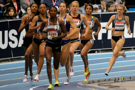 Russian whistleblower and runner Yulia Stepanova (R), who helped expose massive doping problems in Russia that led to the country's track and field team being banned from international competition, competes as a neutral athlete in the 800 meter race at the Boston Indoor Grand Prix in Boston, Massachusetts, U.S. January 28, 2017. REUTERS/Brian Snyder