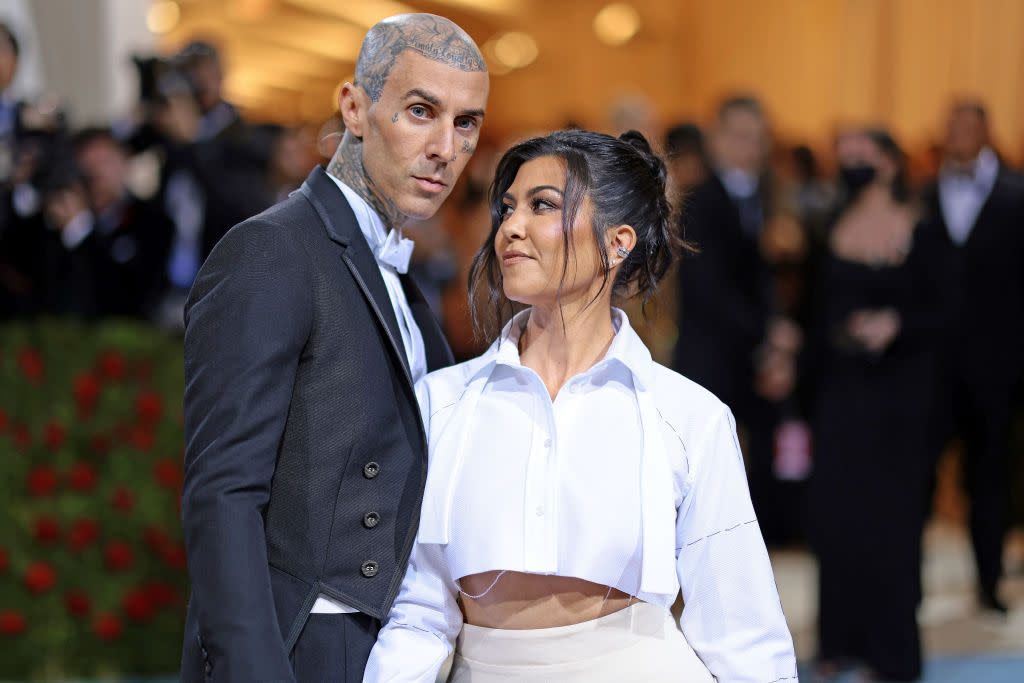 NEW YORK, NEW YORK - MAY 02: (L-R) Travis Barker and Kourtney Kardashian attend The 2022 Met Gala Celebrating "In America: An Anthology of Fashion" at The Metropolitan Museum of Art on May 02, 2022 in New York City. (Photo by Dimitrios Kambouris/Getty Images for The Met Museum/Vogue)