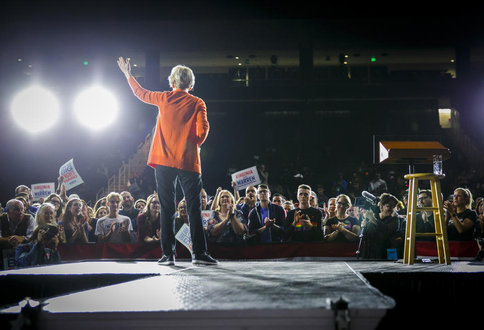 Democratic presidential candidate Elizabeth Warren addresses the crowd during her town hall meeting at Chartway Arena at the Ted Constant Convocation Center in Norfolk, Va., Friday, Oct. 18, 2019. (Kristen Zeis/The Virginian-Pilot via AP)