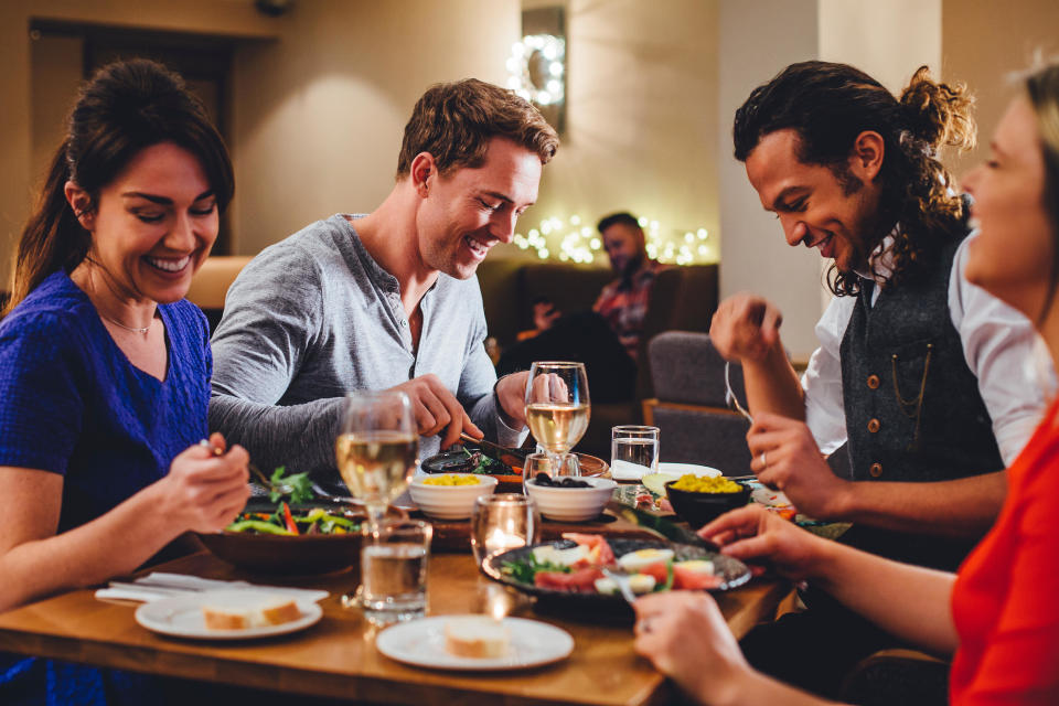 Friends enjoying an evening meal