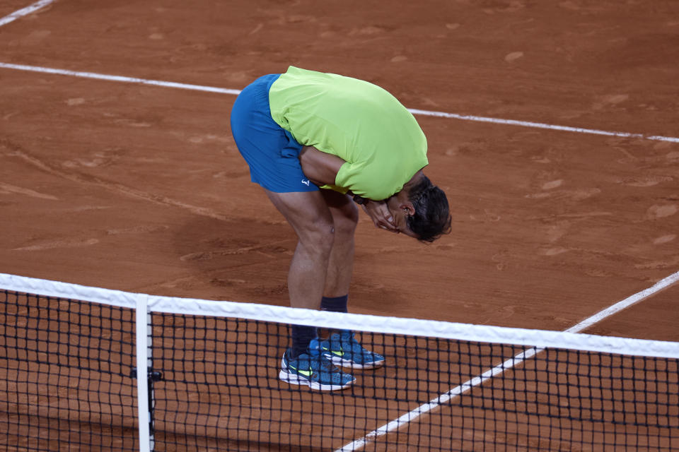 Spain's Rafael Nadal reacts after defeating Serbia's Novak Djokovic during their quarterfinal match of the French Open tennis tournament at the Roland Garros stadium Wednesday, June 1, 2022 in Paris. Nadal won 6-2, 4-6, 6-2, 7-6. (AP Photo/Jean-Francois Badias)