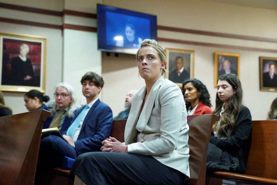 Whitney Henriquez watches a previously recorded video deposition by her sister's acting coach, Kristina Sexton (REUTERS)