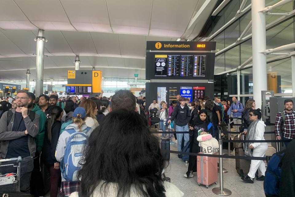 Passengers wait for their flights at Heathrow airport. Photo: PA