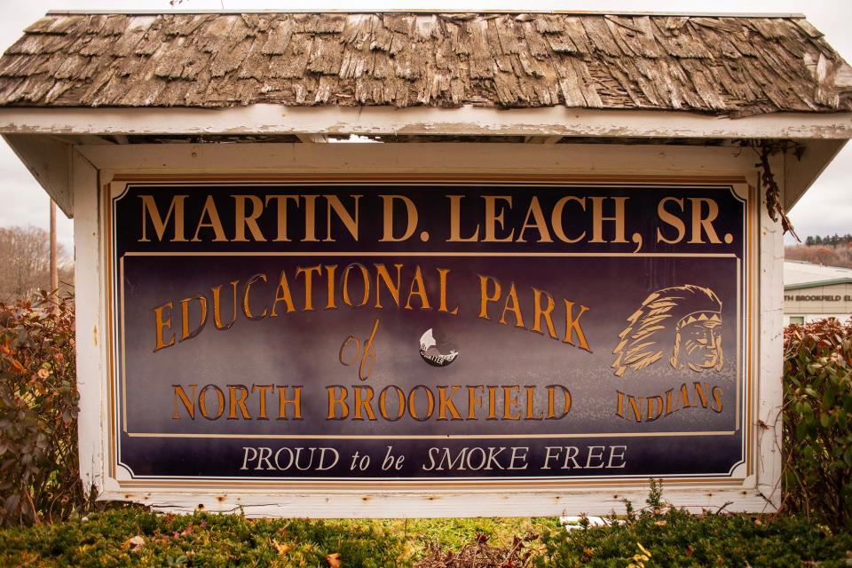 A sign outside the North Brookfield public school complex features an Indian mascot.